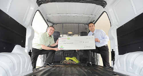 We Care 2 gets new delivery van thanks to a Woolworths donation of $30,000 - (L) Scott Harrison (Pialba store mgr) hands over the money to Pastor Robert Geluk. We Care 2 gets new delivery van thanks to a Woolworths donation of $30,000 - (L) Scott Harrison (Pialba store mgr) hands over the money to Pastor Robert Geluk.